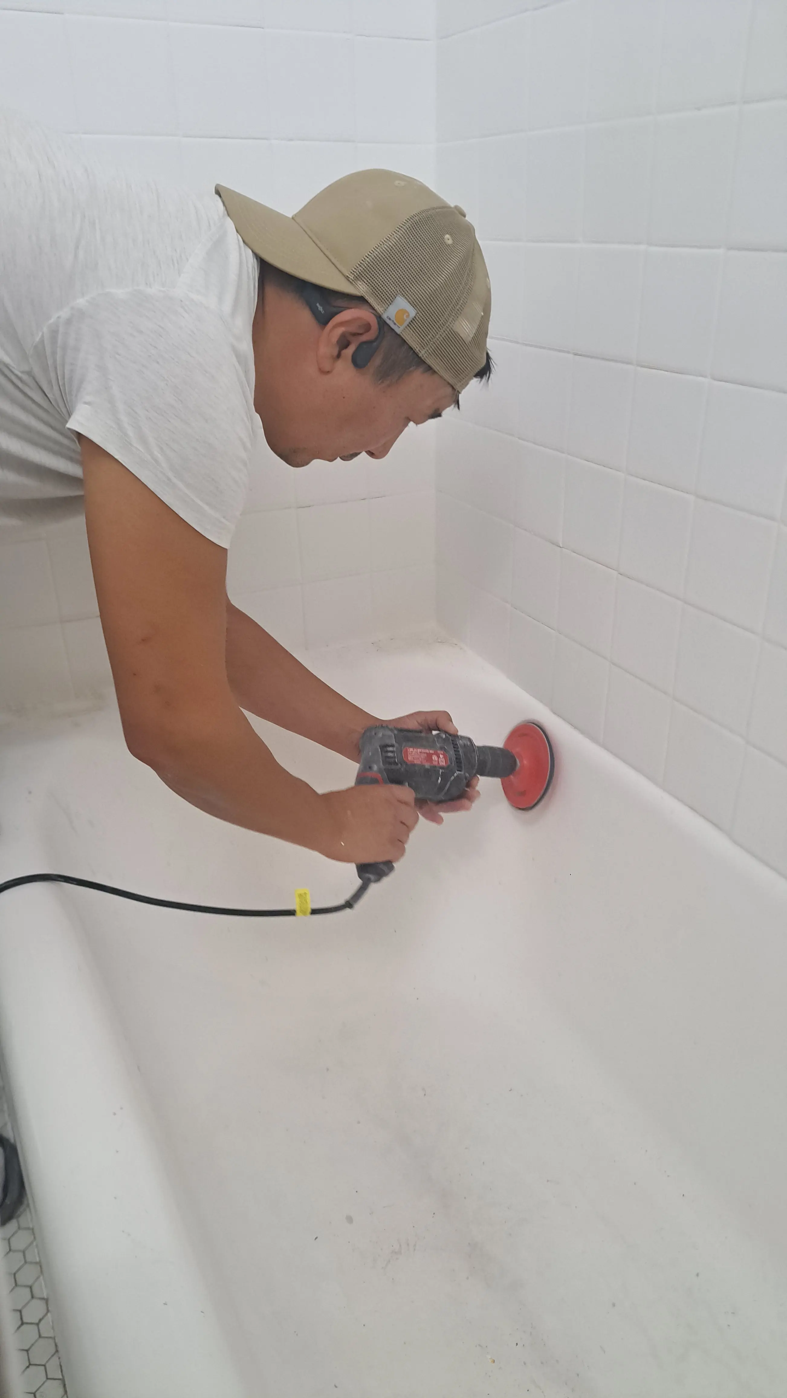 Sanding and surface preparation on an older Park Ridge bathtub